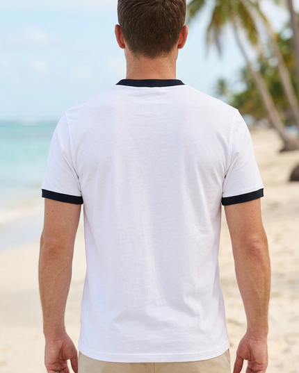 Back view on a white male model on a Caribbean beach