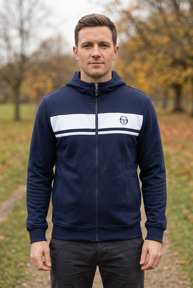 Front view on a white male model in a rural autumn-winter park