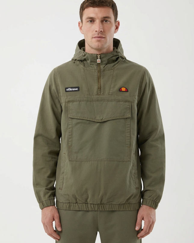 Khaki Ellesse jacket on a white male model