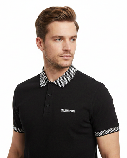 Male model wearing black Lambretta checkerboard polo - side