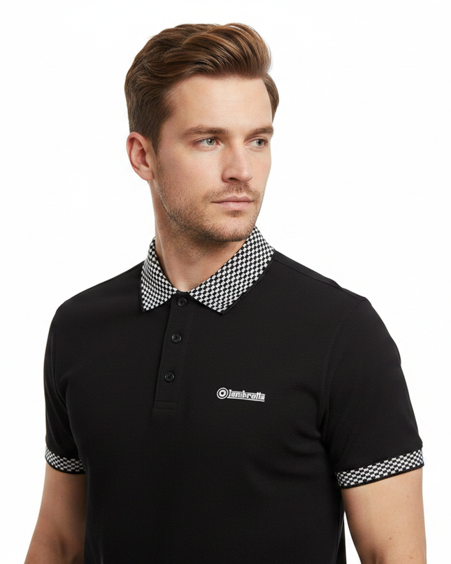 Male model wearing black Lambretta checkerboard polo - side