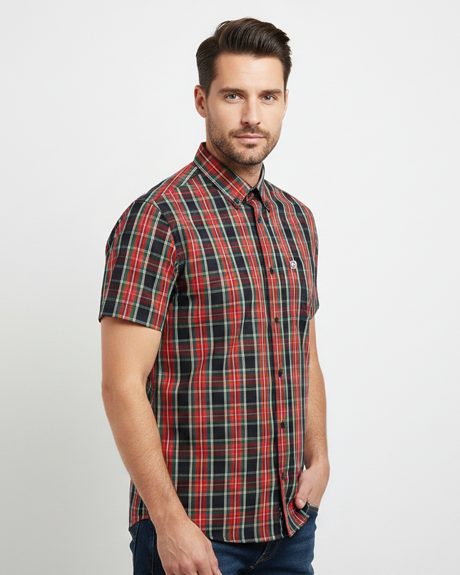 Male model wearing black, red & green Lambretta check shirt - side