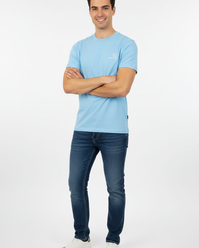 Male model wearing Sergio Tacchini blue tee