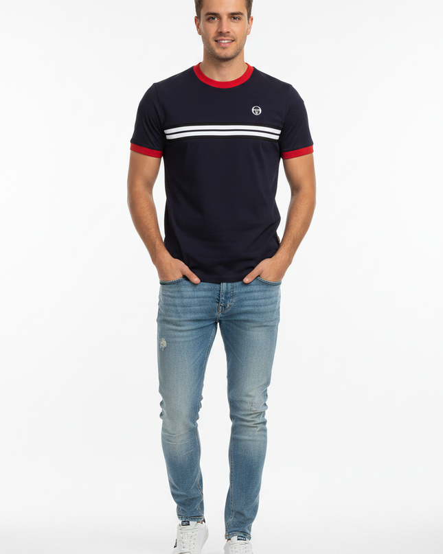 Male model wearing Sergio Tacchini navy tee with red trim