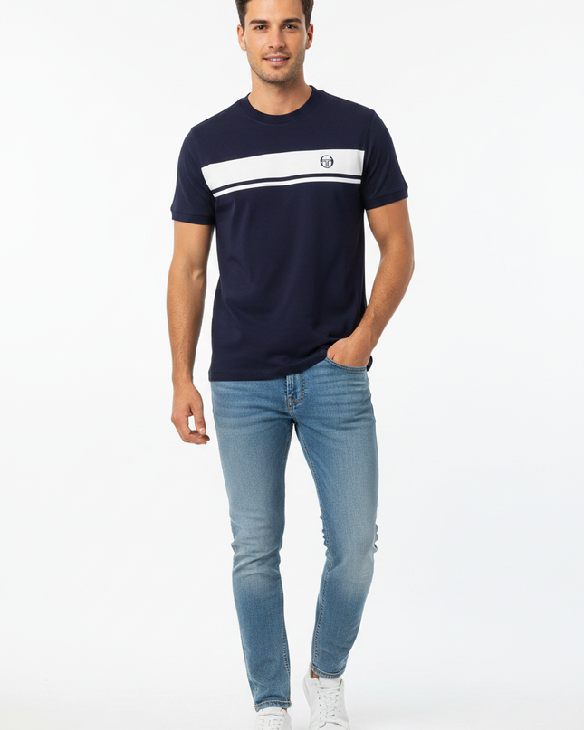 Male model wearing Sergio Tacchini navy tee with white chest stripe