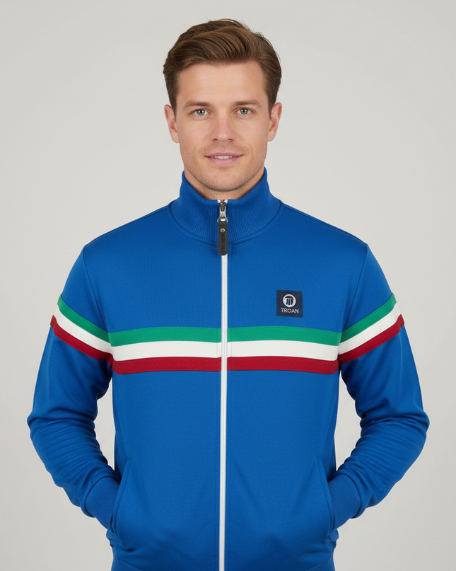 Man wearing royal blue track top with tricolour stripes, upper body